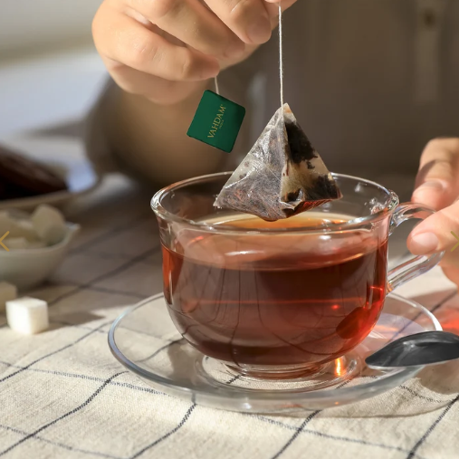 Darjeeling Black Tea Packaging with a Pyramid Tea Bag Packing Machine Darjeeling Black Tea Packaging with a Pyramid Tea Bag Packing Machine